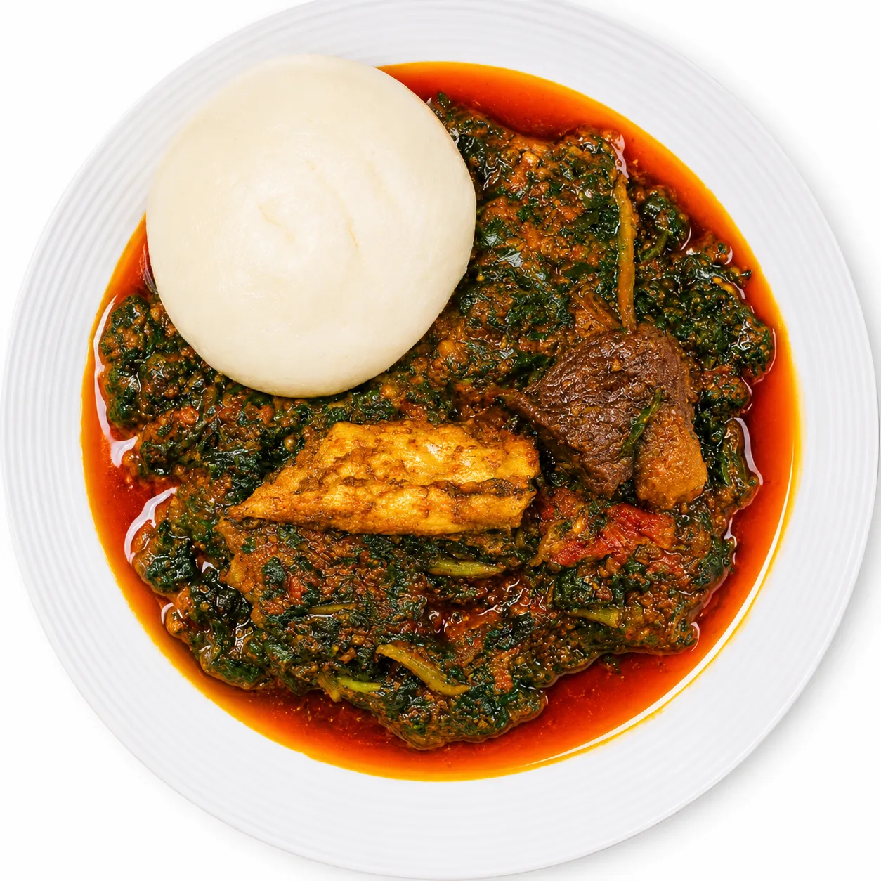 Pounded Yam and Egusi Soup at Akin's African Restaurant in Winnipeg